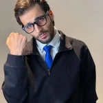 نیم‌زیپ سلانیک پولو رنگ مشکی - مدل پوشیده